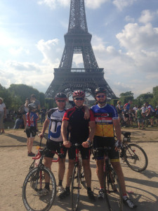 The team in front of the Eiffel Tower